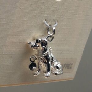New old stock solid sterling silve 925 dog charm tarnish free, rhodium plated.